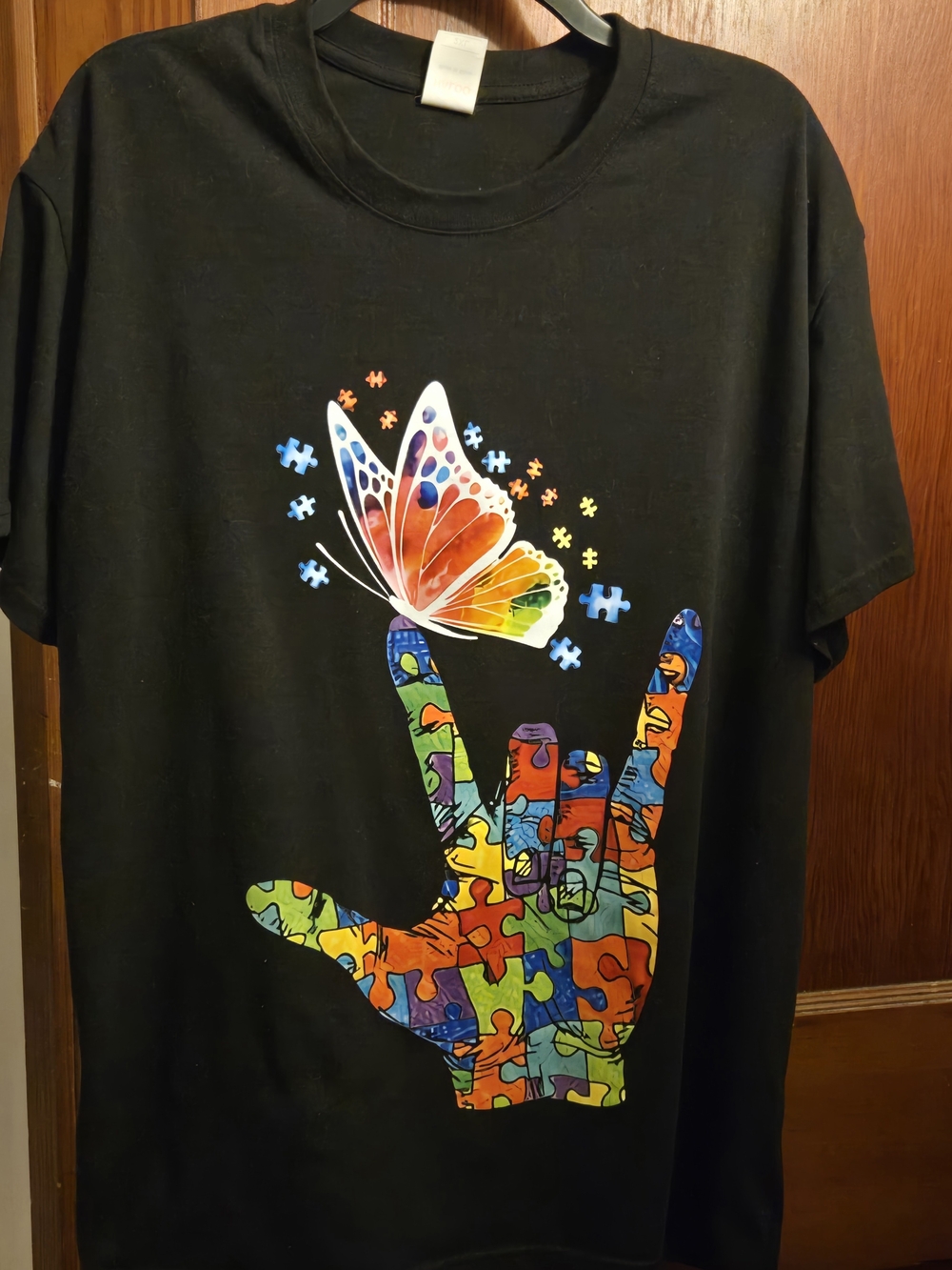 Autism Awareness Halo Black Tee with Rainbow Puzzle-Hand & Multicolor Butterfly